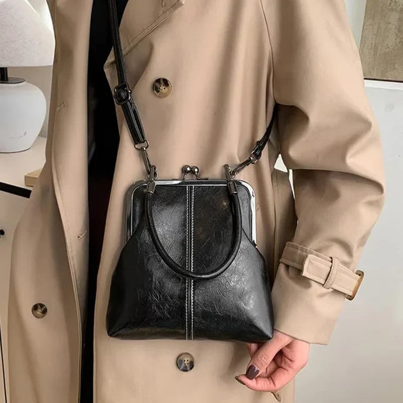 Alicia — Vintage Muschel-Umhängetasche | 50% RABATT