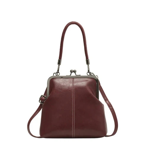 Alicia — Vintage Muschel-Umhängetasche | 50% RABATT