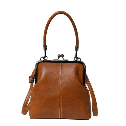 Alicia — Vintage Muschel-Umhängetasche | 50% RABATT
