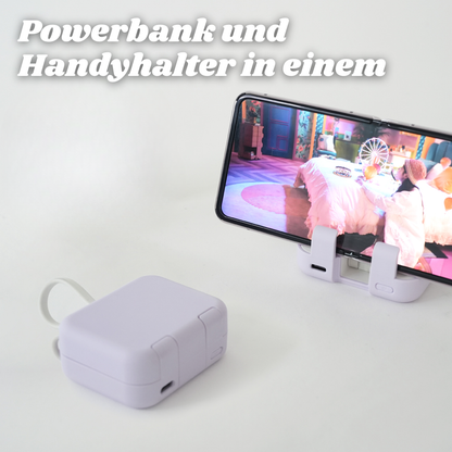 TravelCharge™ | Faltbarer Handyhalter mit Powerbank