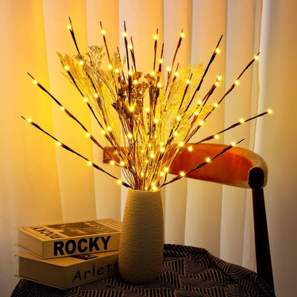 LED-Lichterzweige auf dem Sideboard