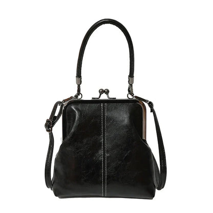 Alicia — Vintage Muschel-Umhängetasche | 50% RABATT