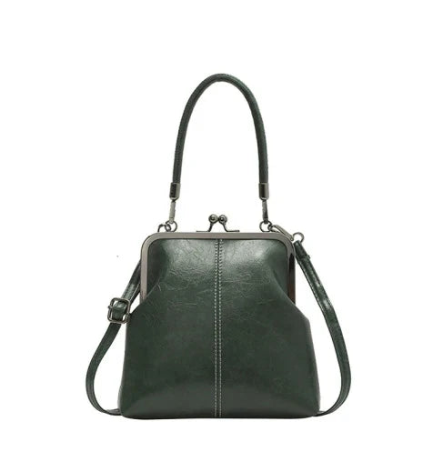 Alicia — Vintage Muschel-Umhängetasche | 50% RABATT