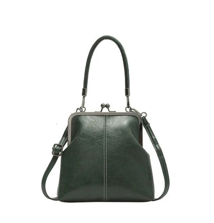 Alicia — Vintage Muschel-Umhängetasche | 50% RABATT