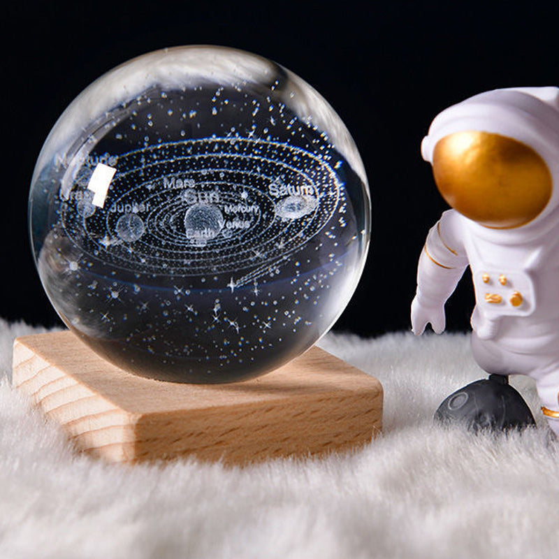 3D-Kristallkugel mit Sonnensystem-Motiv